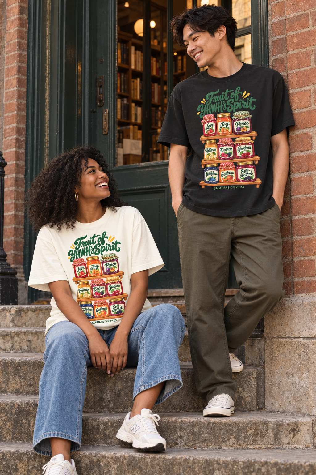 Two models wearing vintage-white and washed-black Fruit of YHWH’s Spirit heavyweight oversized tees