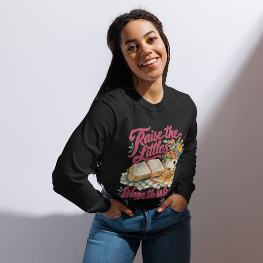 Woman modeling the black Raise the Littles, Wage the War garment-dyed long-sleeve tee