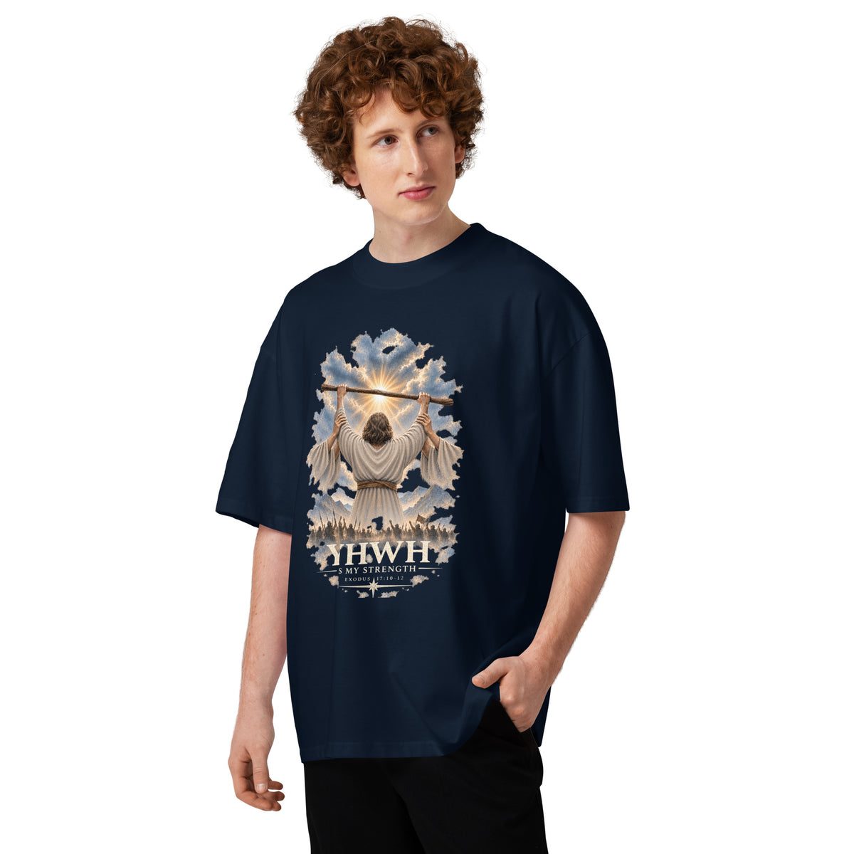 Model wearing the French navy YHWH Is My Strength oversized organic tee inspired by Exodus 17